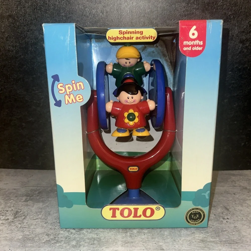 Vintage tolo baby toy that suctions to table spinning highchair activity